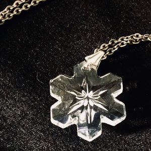 Crystal snowflake necklace on gold-plated chain
